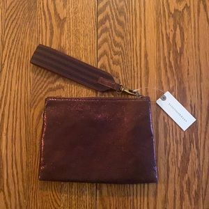 NWT Anthropologie shimmer plum wristlet